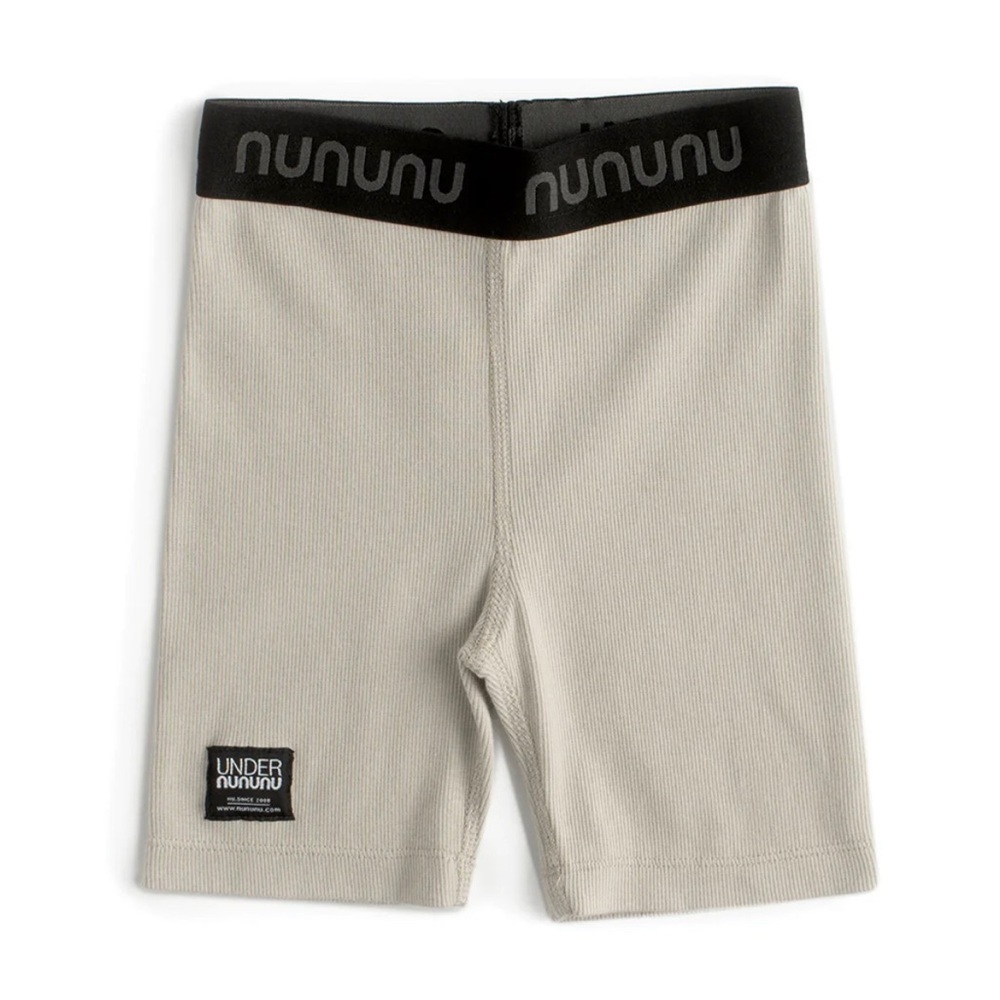 Nununu Kids Base layer tights in beige. Unisex one pair. 8 to 9 year